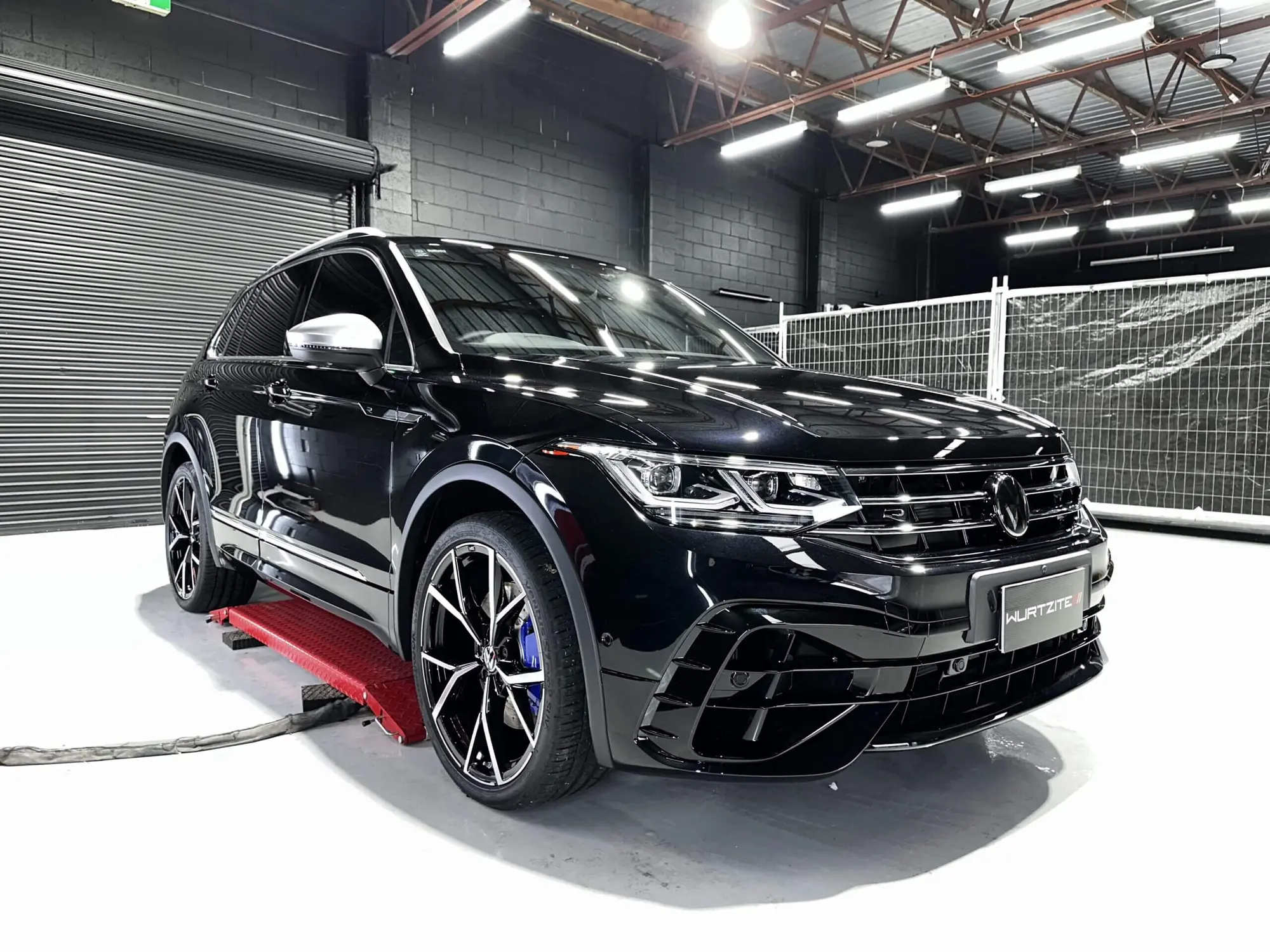Black Volkswagen Tiguan R with gloss restored after multi-stage paint correction in Adelaide